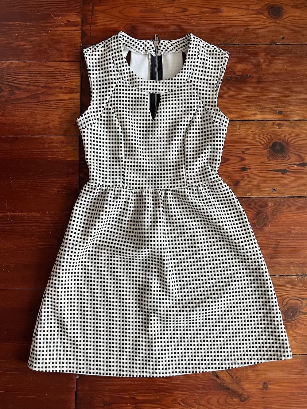Black and white checkered dress with cutout details